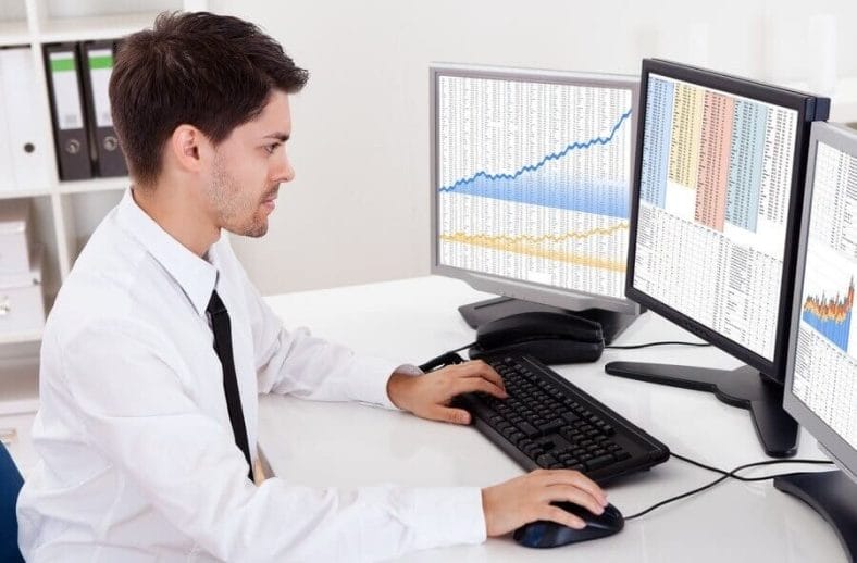 A diligent stockbroker enthusiastically analyzing charts to make informed investment decisions in stocks and bonds.